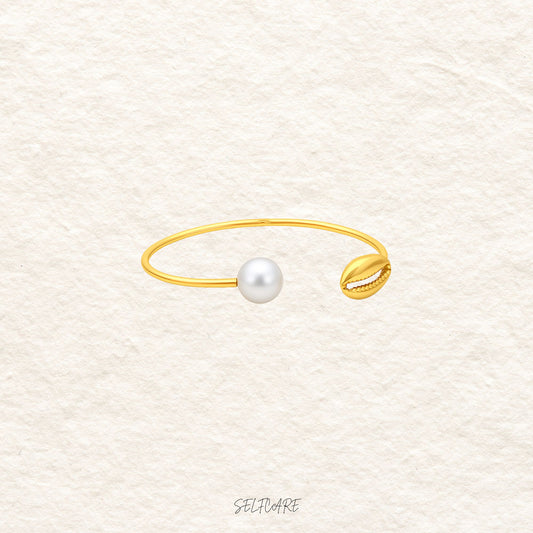 Perlenarmband mit Muschel